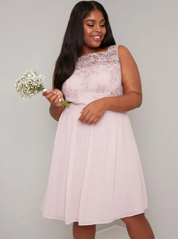 Plus Size Lace Bodice Midi Dress in Pink sold by Chi Chi London