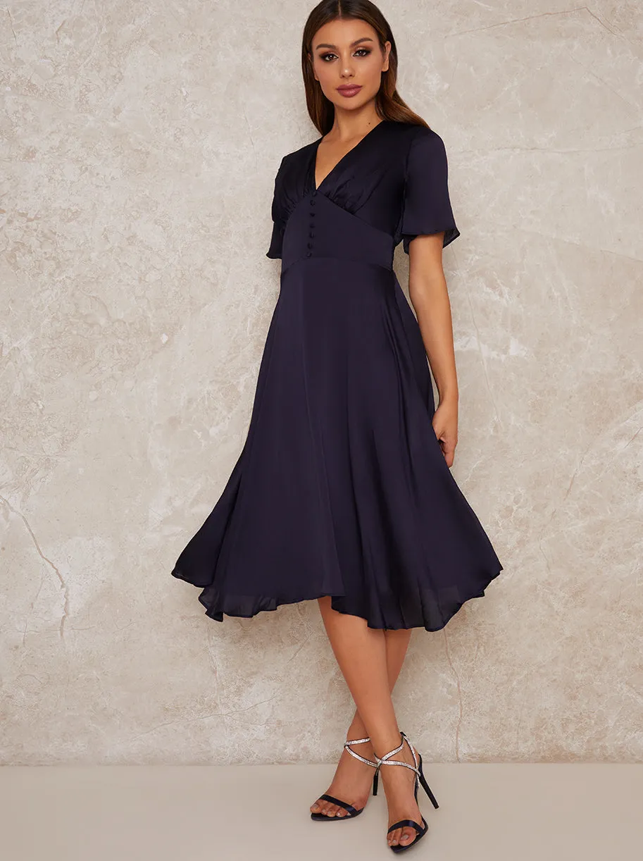 Angel Sleeve V Neck Silky Midi Dress in Blue sold by Chi Chi London