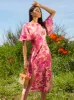 Plus Size Floral & Animal Print Midi Dress in Multi sold by Chi Chi London
