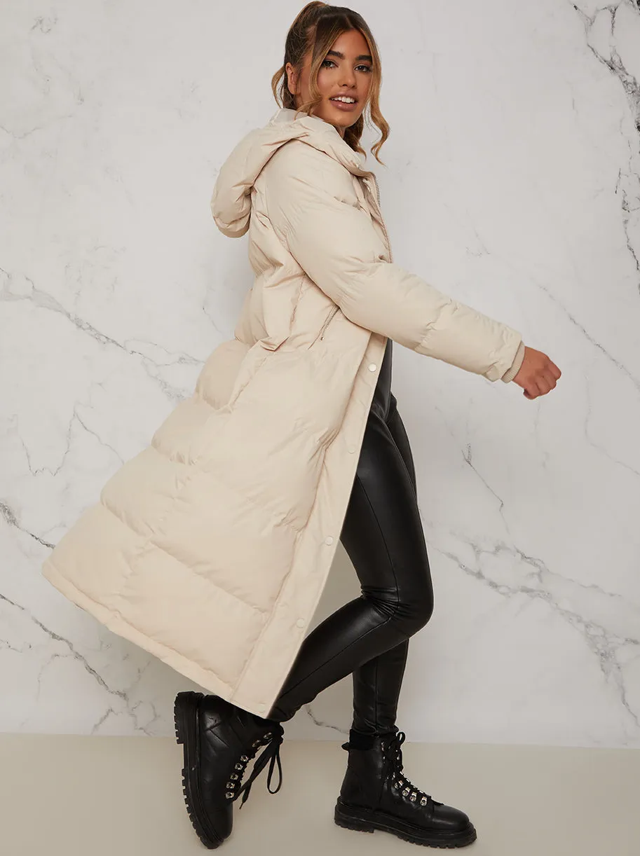 Longline Oversized Padded Puffer Coat in Beige sold by Chi Chi London