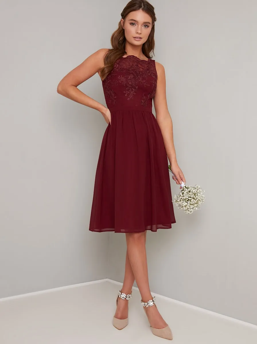 Sleeveless Lace Bodice Chiffon Midi Dress in Red sold by Chi Chi London