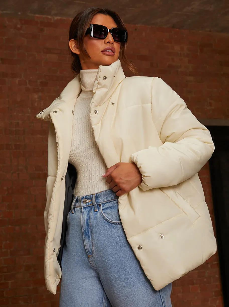 Oversized Duvet Short Padded Coat in Cream sold by Chi Chi London