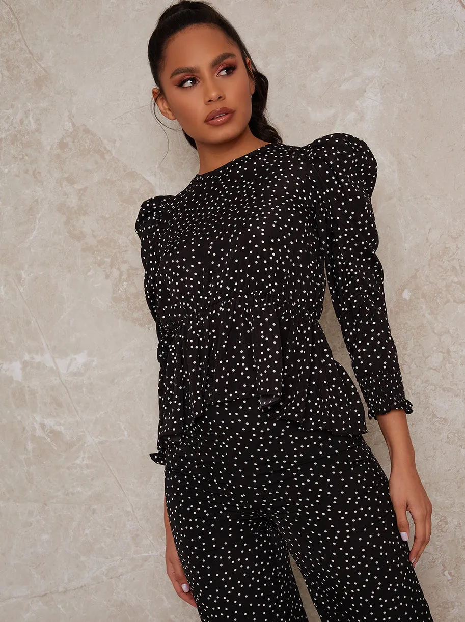 Polka Dot Peplum in Mono sold by Chi Chi London
