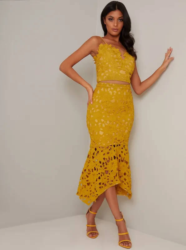 Premium Lace Peplum Hem Midi Skirt in Yellow sold by Chi Chi London