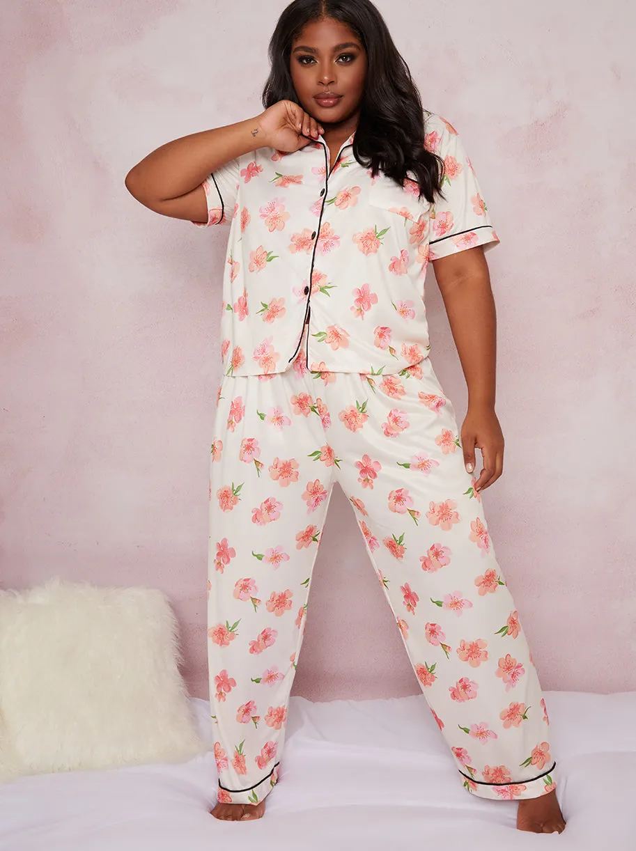 Plus Size Floral Print Pyjama Set in White sold by Chi Chi London