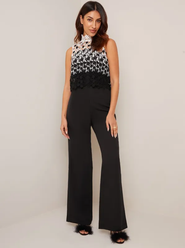 High Neck Crochet Overlay Wide Leg Jumpsuit in Black sold by Chi Chi London