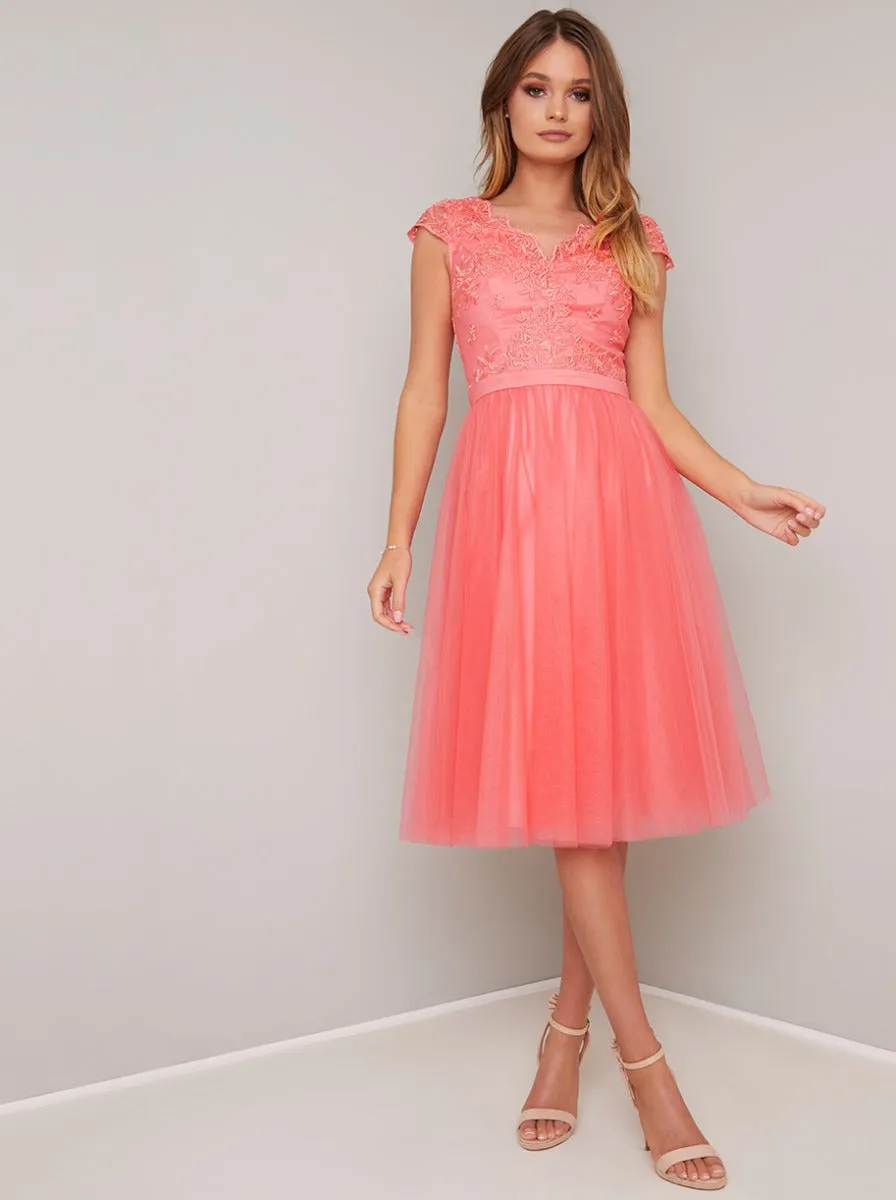 Skater Midi Dress in Coral sold by Chi Chi London