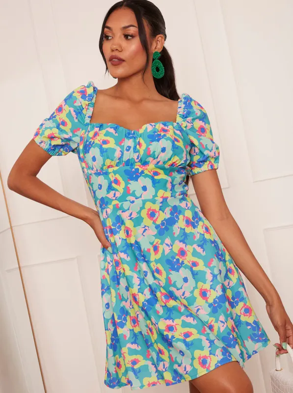 Puff Sleeve Floral Print Mini Dress in Green sold by Chi Chi London