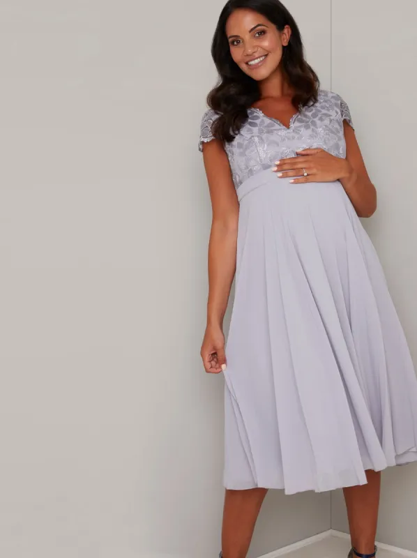 Maternity Lace Cap Sleeved Midi Dress in Blue sold by Chi Chi London
