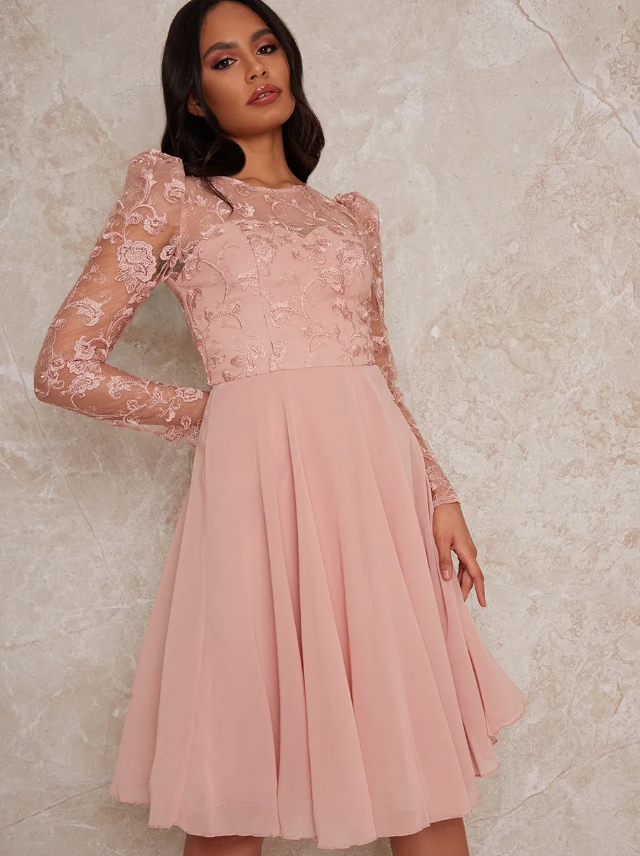 Sheer Long Sleeve Embroidered Skater Dress in Pink sold by Chi Chi London