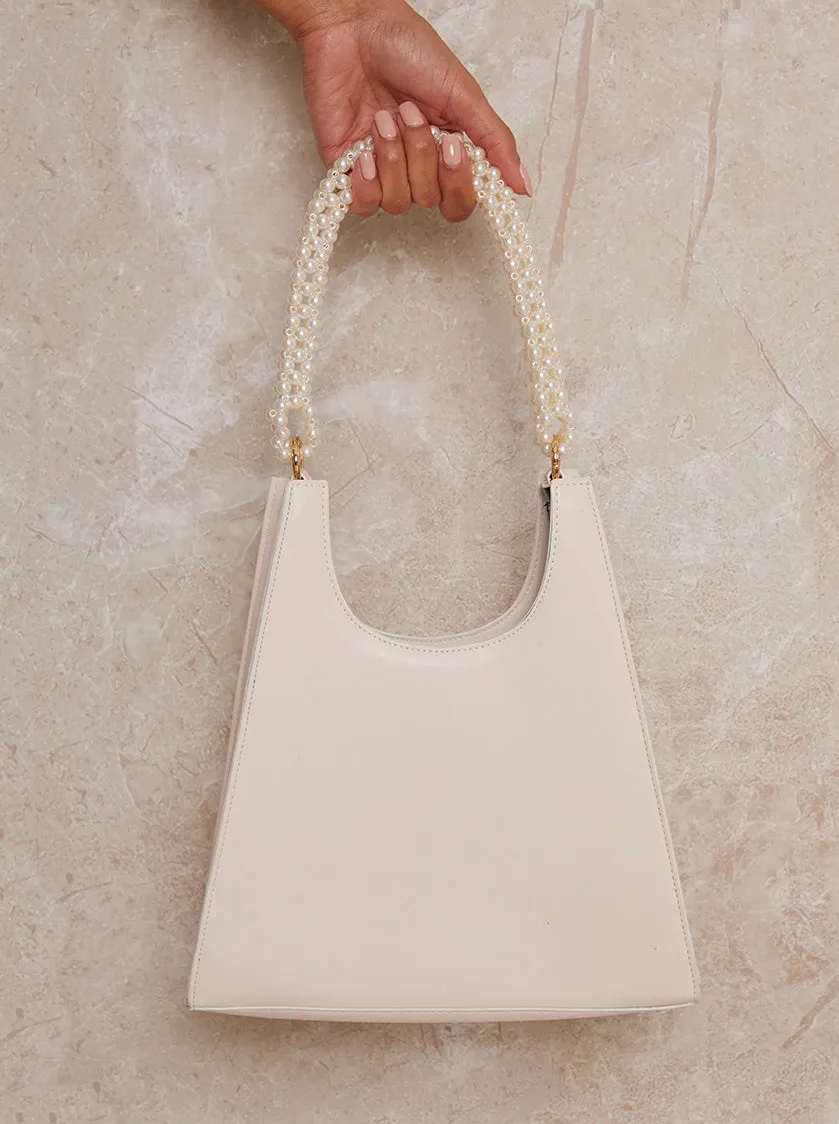 Faux Pearl Box Handbag in White sold by Chi Chi London