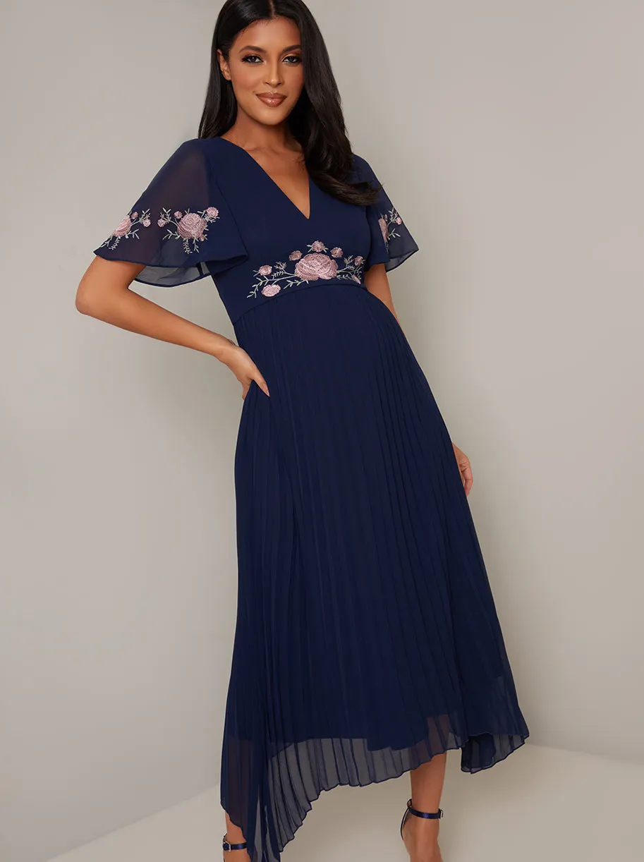 Maternity Dip Hem Lace Chiffon Dress in Blue sold by Chi Chi London