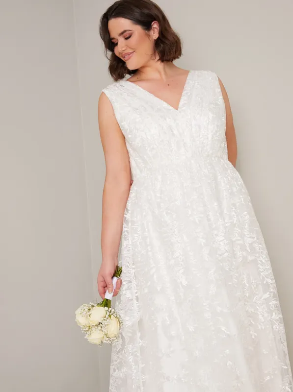 Plus Size Bridal Embroidered Wedding Dress in White sold by Chi Chi London