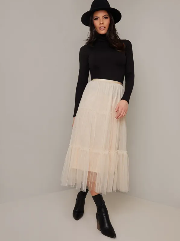 Tiered Design Tulle Midi Skirt in Cream sold by Chi Chi London