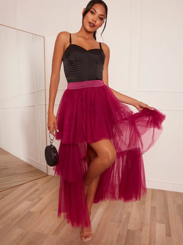 Tiered Tulle Dip Hem Skirt in Purple sold by Chi Chi London