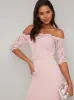 Lace Bodice Bodycon Midi Dress in Pink sold by Chi Chi London