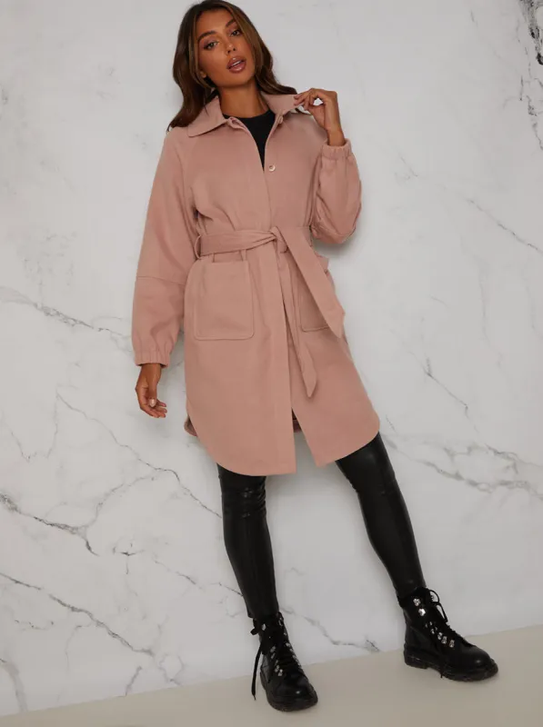 Oversized Puff Sleeve Coat with Tie Waist in Pink sold by Chi Chi London