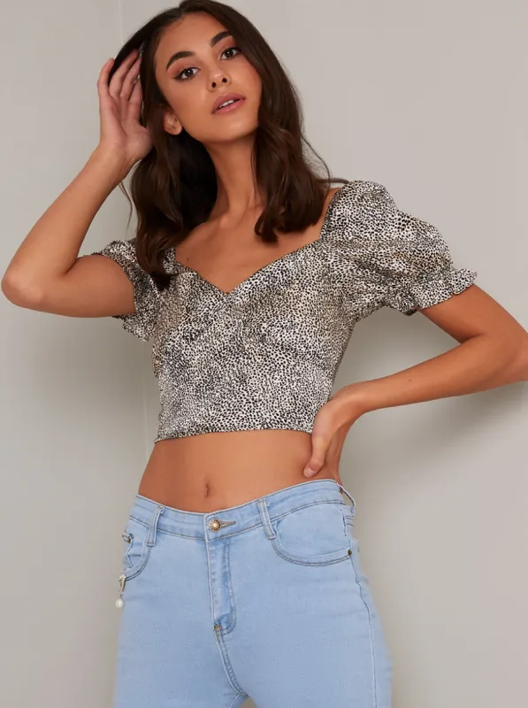Short Puff Sleeve Crop Top In Animal Pint sold by Chi Chi London