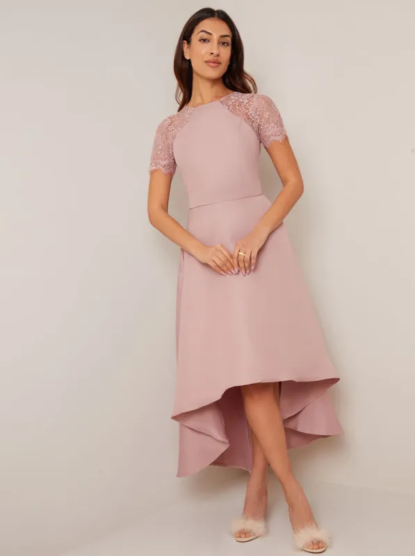 Lace Sleeve Dip Hem Dress in Pink sold by Chi Chi London