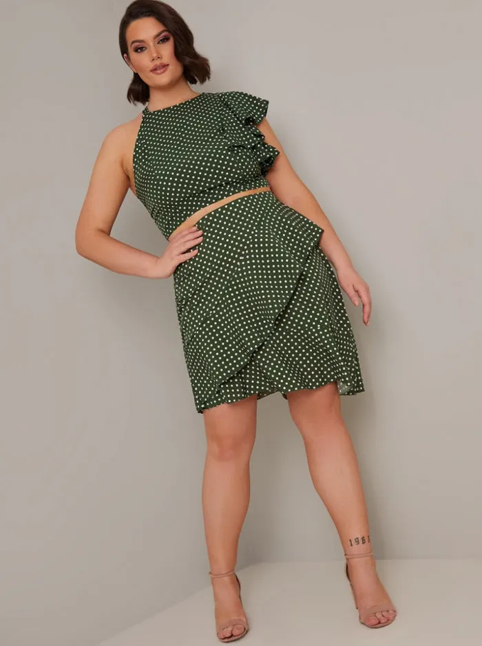 Plus Size Polka Dot Ruffle Mini Skirt in Green sold by Chi Chi London