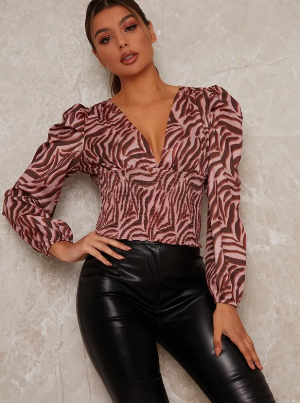 Animal Print Balloon Sleeve Top in Pink sold by Chi Chi London