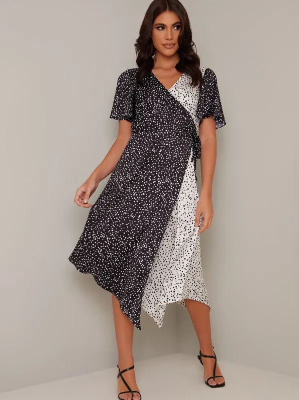 Contrast Spot Detail Wrap Style Midi Dress in Black sold by Chi Chi London