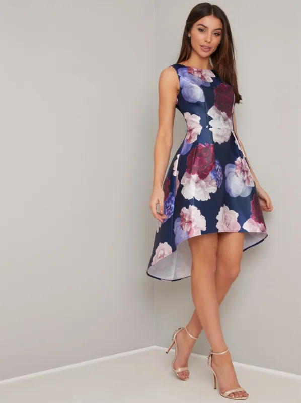Floral Print Dip Hem Mini Dress in Blue sold by Chi Chi London