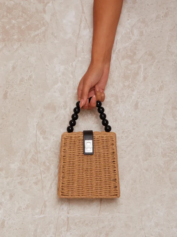 Wicker Box Bag with Beaded Handle in Brown made by Chi Chi London