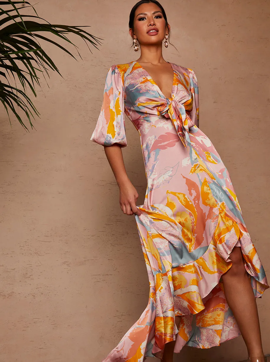 Tie Front Printed Dip Hem Dress in Pink sold by Chi Chi London