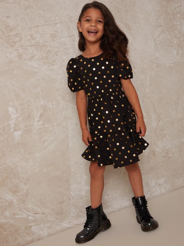 Girls Short Sleeve Polka Dot Midi Dress in Black made by Chi Chi London