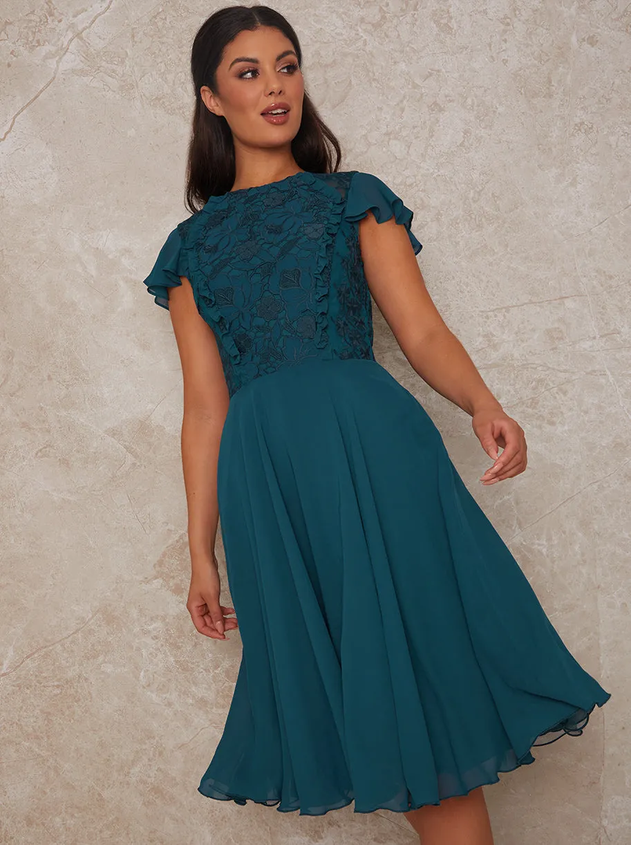 Cap Sleeve Floral Premium Lace Midi Dress in Green sold by Chi Chi London