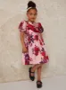 Girls Puff Sleeve Floral Midi Dress in Blush sold by Chi Chi London