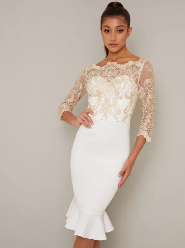 Embroidered Bodycon Peplum Hem Midi Dress in Cream sold by Chi Chi London