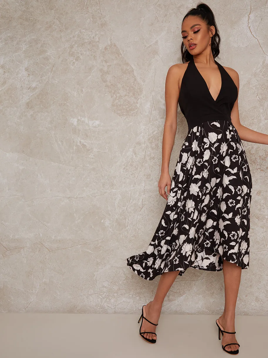 Halterneck Floral Dip Hem Dress in Monochrome sold by Chi Chi London