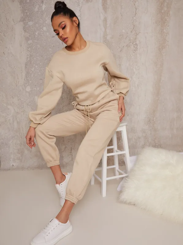 Ruched Detail Sweatshirt & Jogger Loungewear Set in Biege sold by Chi Chi London