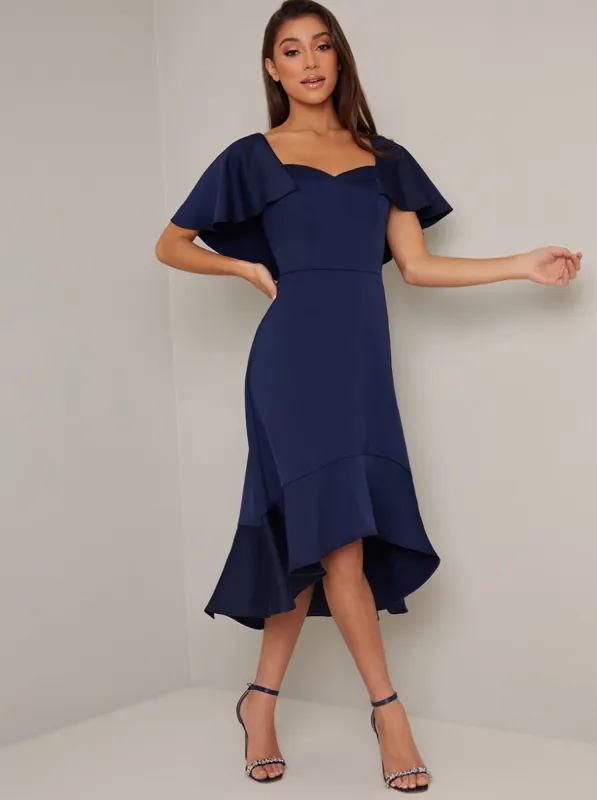 Cape Detail Dip Hem Midi Dress in Blue sold by Chi Chi London