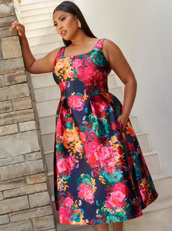 Plus Size Sleeveless Floral Fit and Flare Midi Dress in Navy sold by Chi Chi London