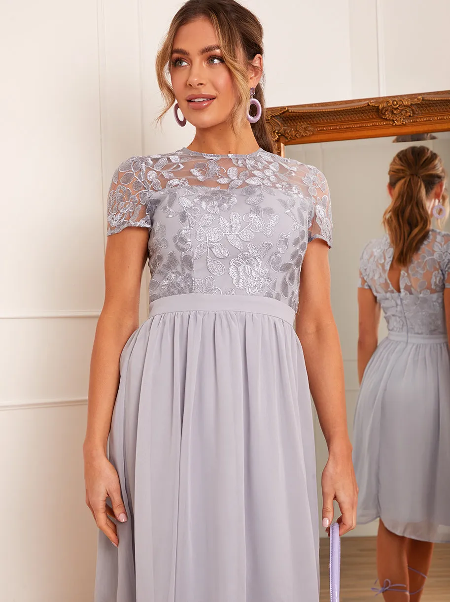 Lace Bodice Pleated Midi Dress in Blue sold by Chi Chi London