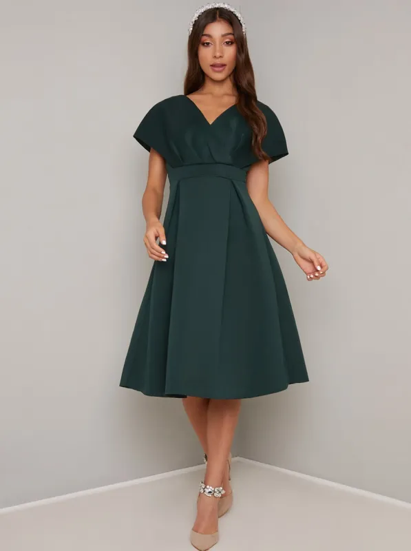 Wrap Bodice Pleat Midi Dress in Green sold by Chi Chi London
