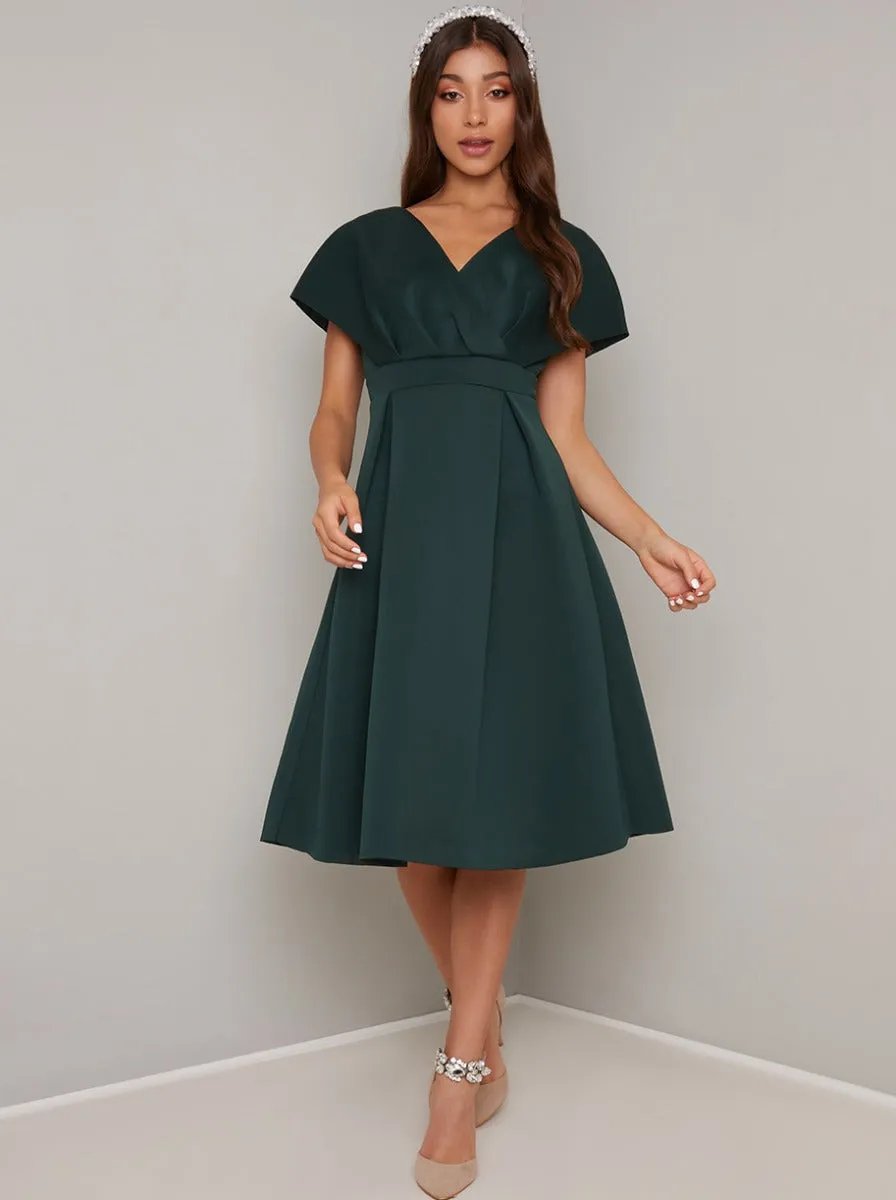 Wrap Bodice Pleat Midi Dress in Green sold by Chi Chi London