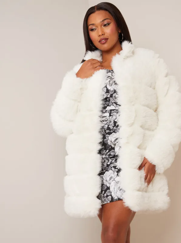 Faux Fur Stripe Longline Coat in Cream sold by Chi Chi London