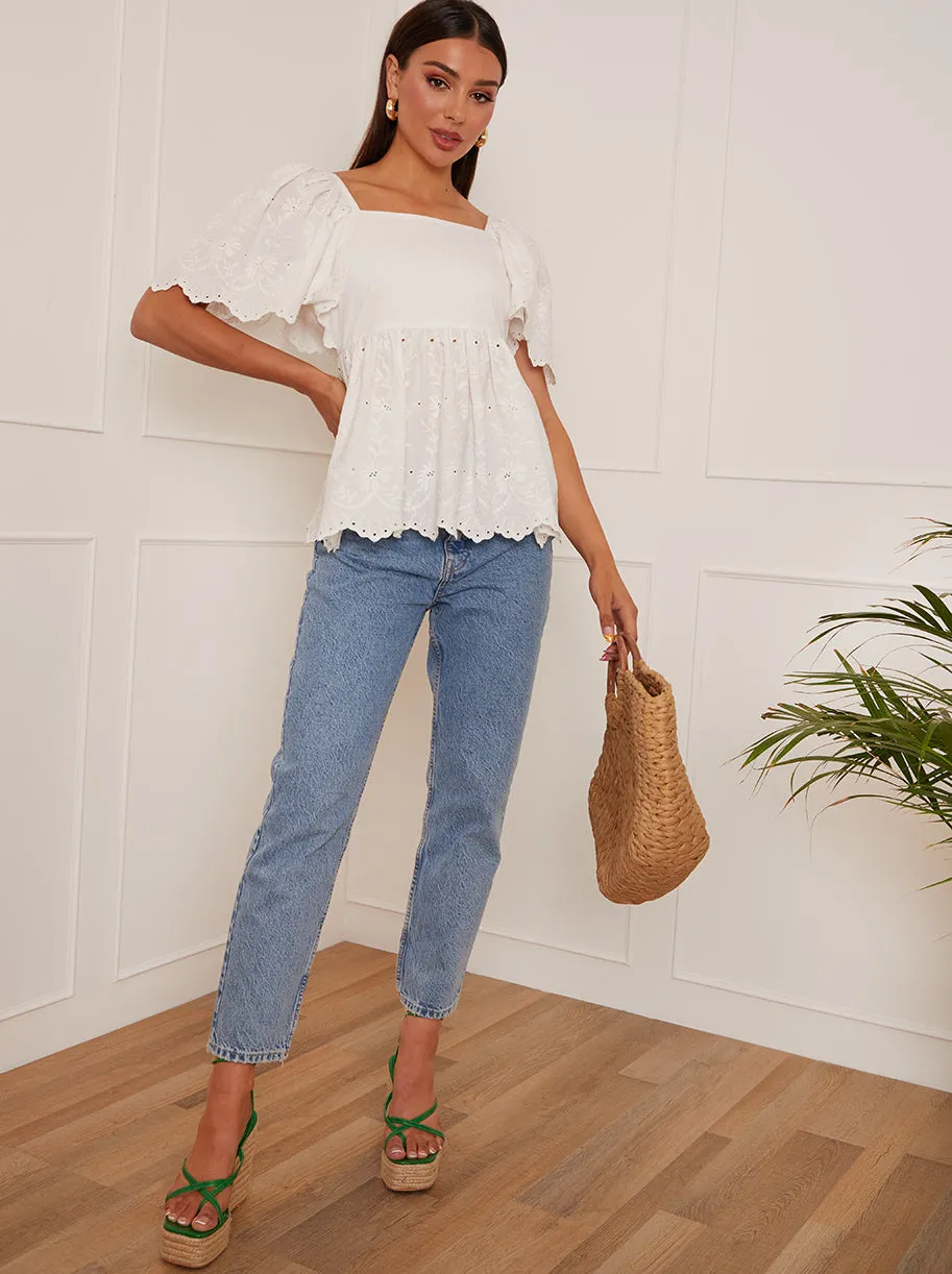 Short Sleeve Broderie Anglaise Peplum Top in White sold by Chi Chi London product image thumbnail 5