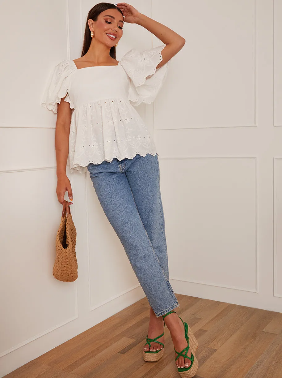 Short Sleeve Broderie Anglaise Peplum Top in White sold by Chi Chi London product image thumbnail 4