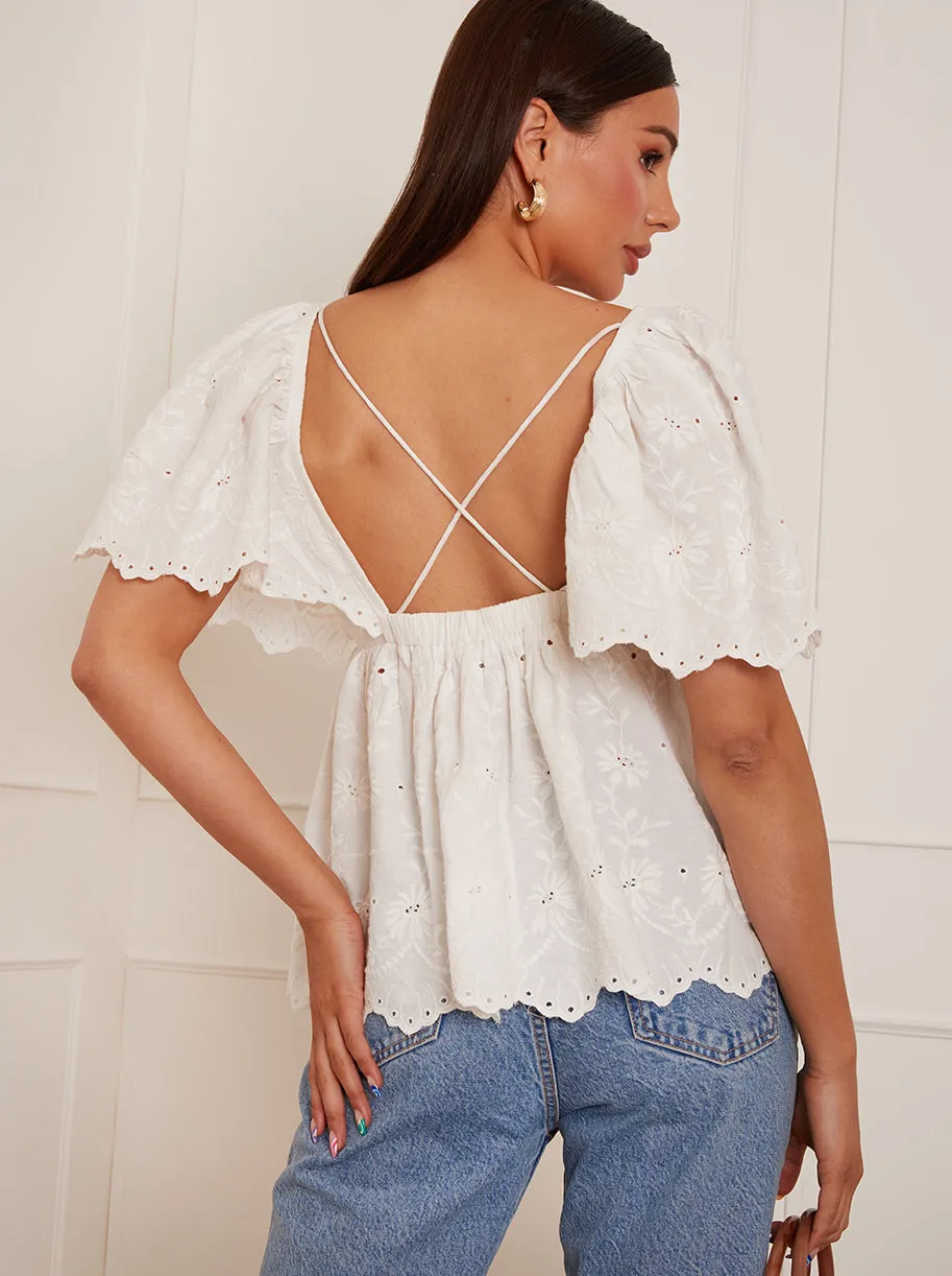 Short Sleeve Broderie Anglaise Peplum Top in White sold by Chi Chi London product image thumbnail 2