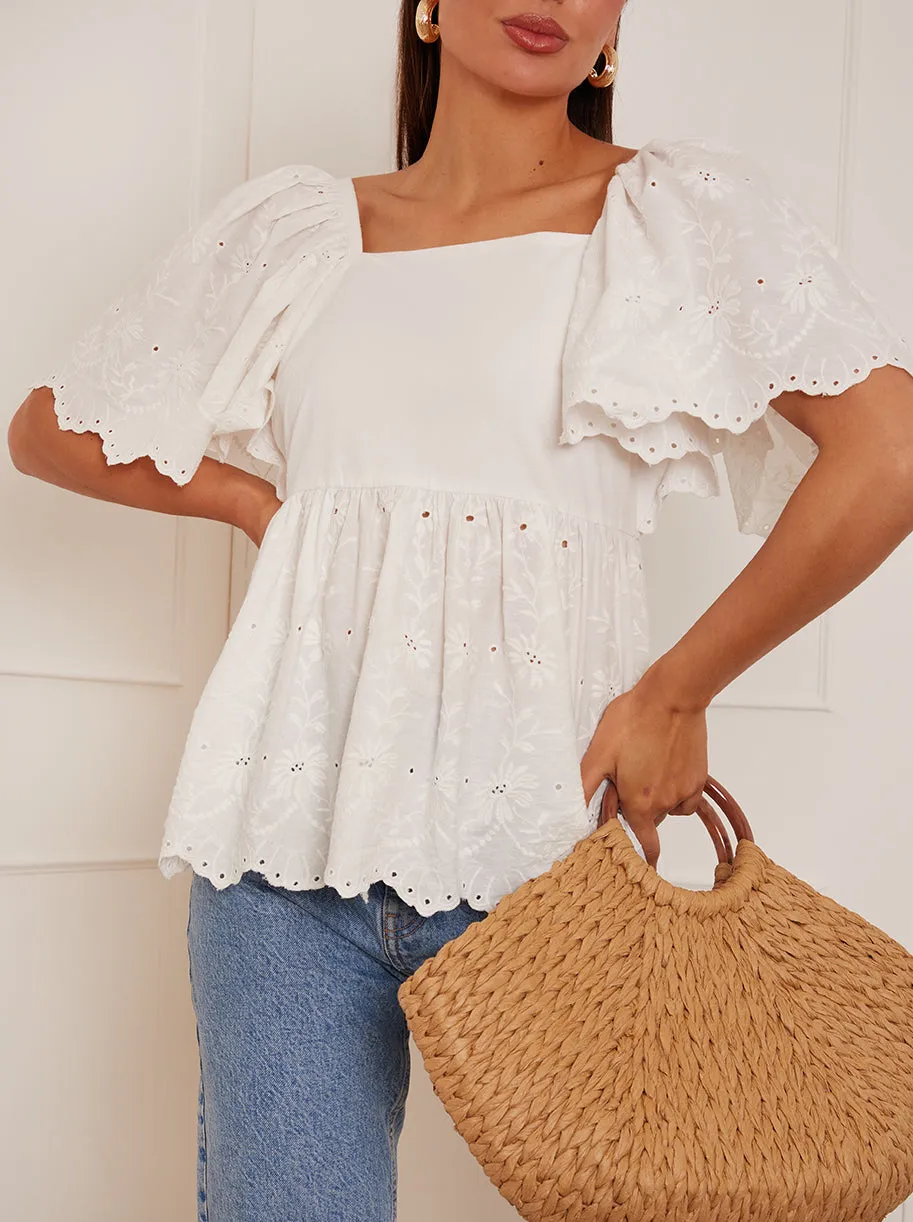 Short Sleeve Broderie Anglaise Peplum Top in White sold by Chi Chi London product image thumbnail 3