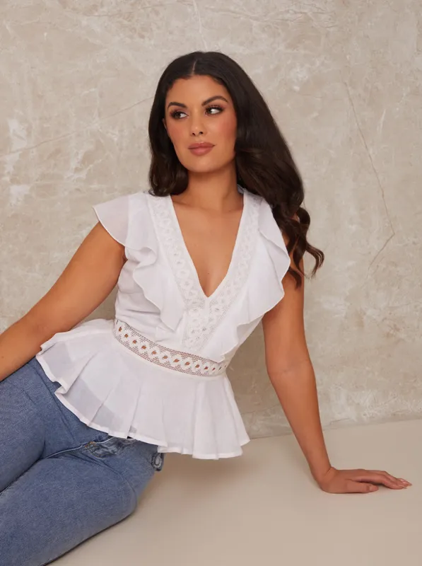 V Neck Ruffle Top with Broderie Insert in White sold by Chi Chi London