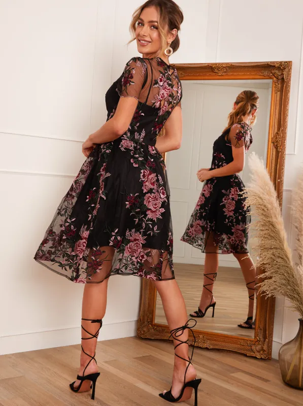 Floral Embroidered Overlay Midi Dress in Black sold by Chi Chi London