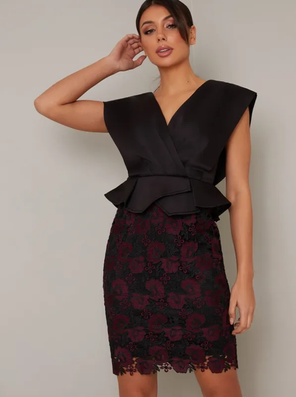 Wrap Style Bodice Peplum Lace Midi Dress in Black sold by Chi Chi London