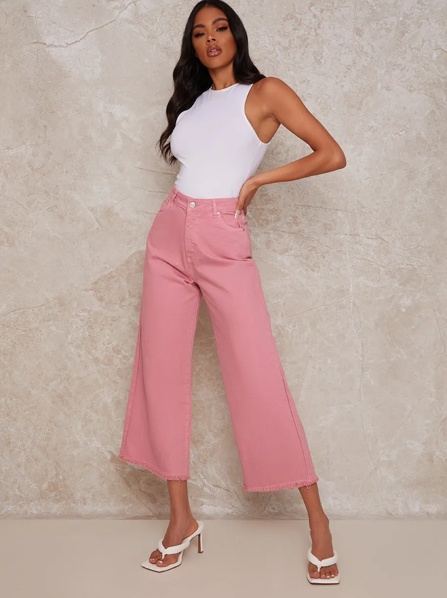 High Waisted Wide Leg Denim Jeans in Pink sold by Chi Chi London