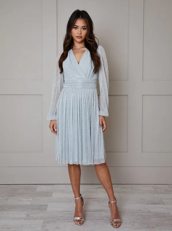Long Sleeve Glitter Plisse Wrap Midi Dress in Silver sold by Chi Chi London